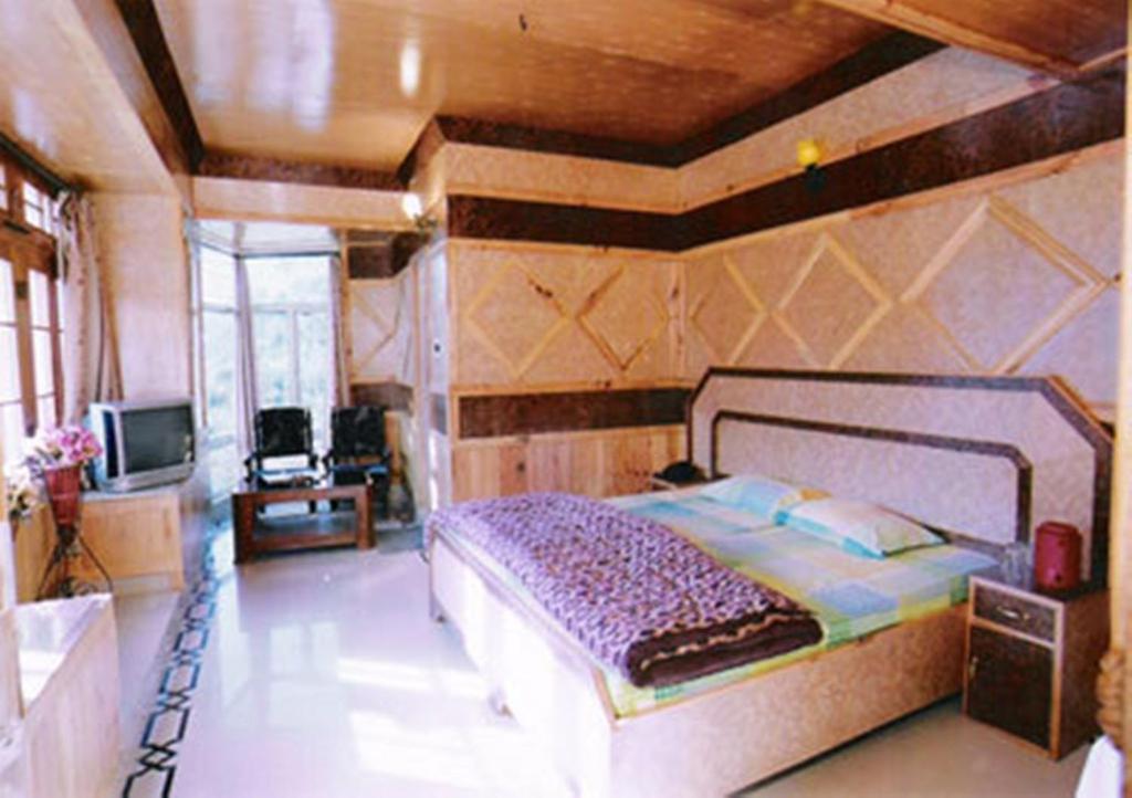 Hotel Arsh International Nainital Quarto foto